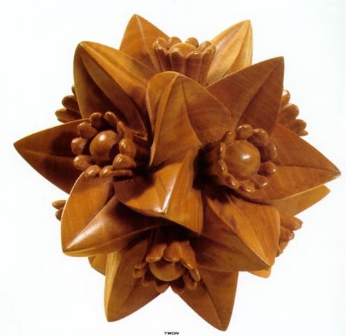 Escher_Polyhedron-with-Flowers_1958.jpg